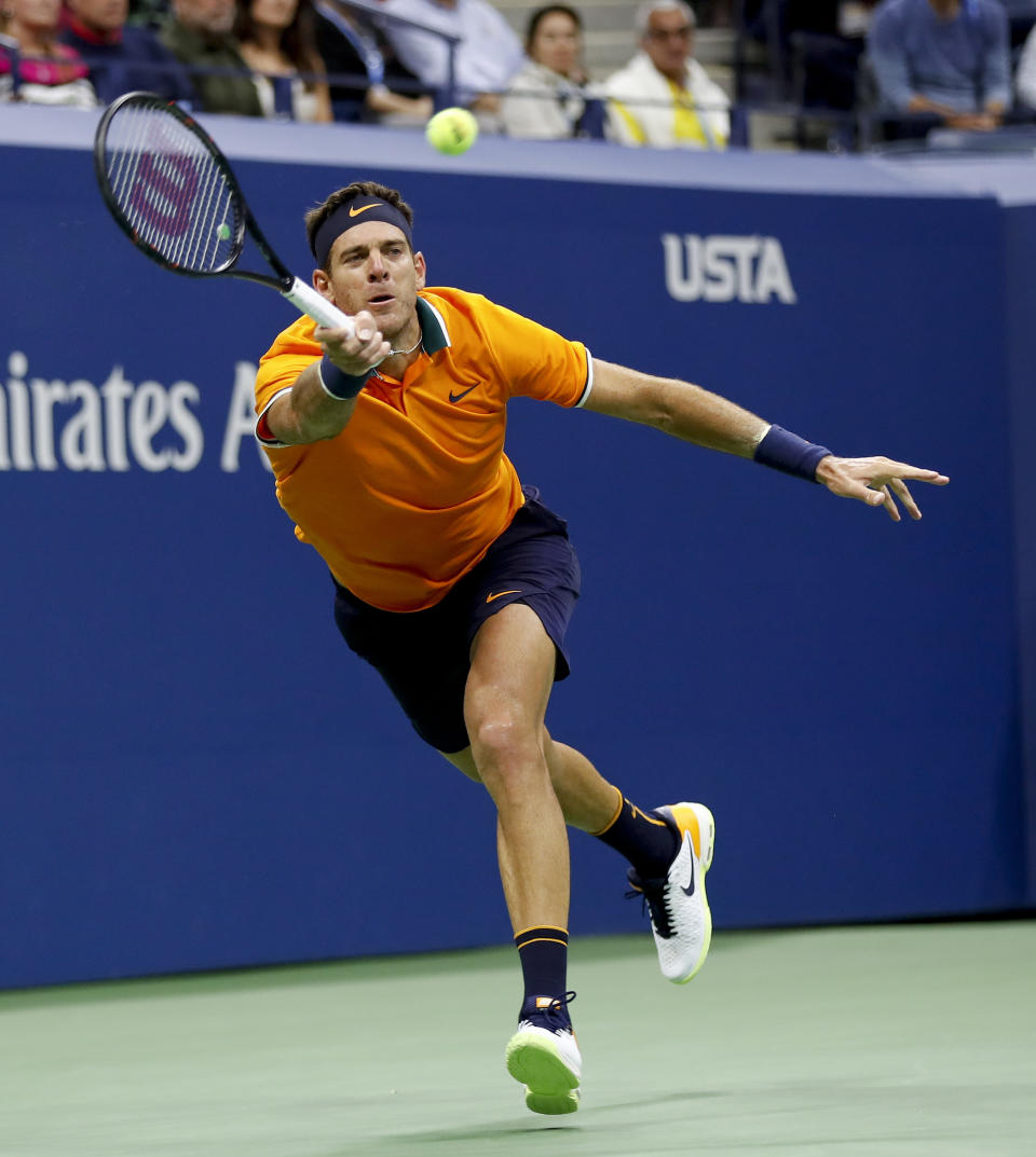 Juan Martin del Potro, of Argentina, returns a shot to Novak Djokovic, of Serbia, during the men's final of the U.S. Open tennis tournament, Sunday, Sept. 9, 2018, in New York. (AP Photo/Adam Hunger)