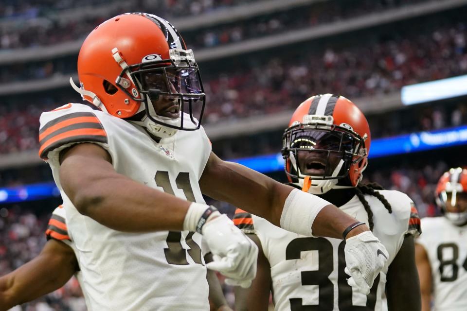 Cleveland Browns wide receiver Donovan Peoples-Jones (11) celebrates after scoring a touchdown on a 76-yard punt return during the first half of an NFL football game between the Cleveland Browns and Houston Texans in Houston, Sunday, Dec. 4, 2022,. (AP Photo/Eric Christian Smith)