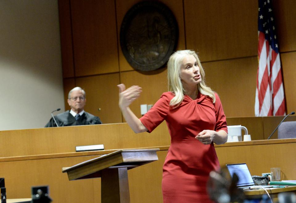 Prosecutor Audry Nafziger stands in front of Judge David Worley and addresses the jury during her opening statement in the trial of Bryn Spejcher.