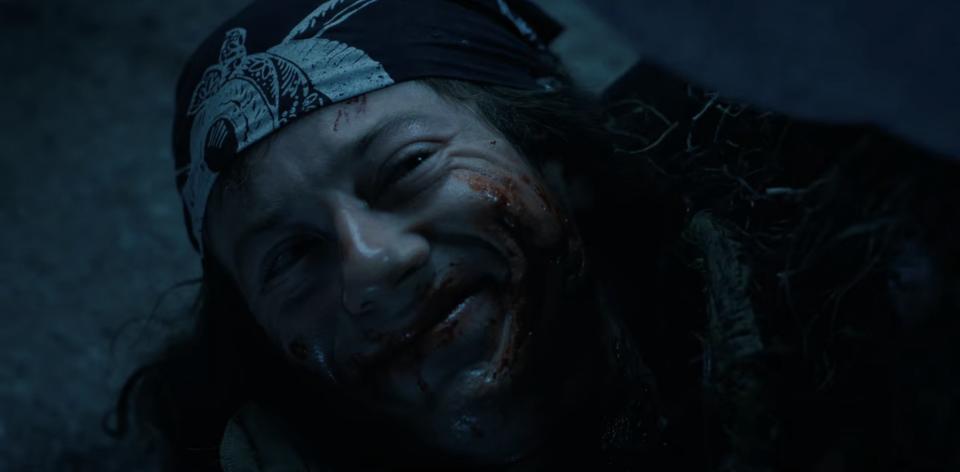 Eddie smiling as he dies in "Stranger Things"