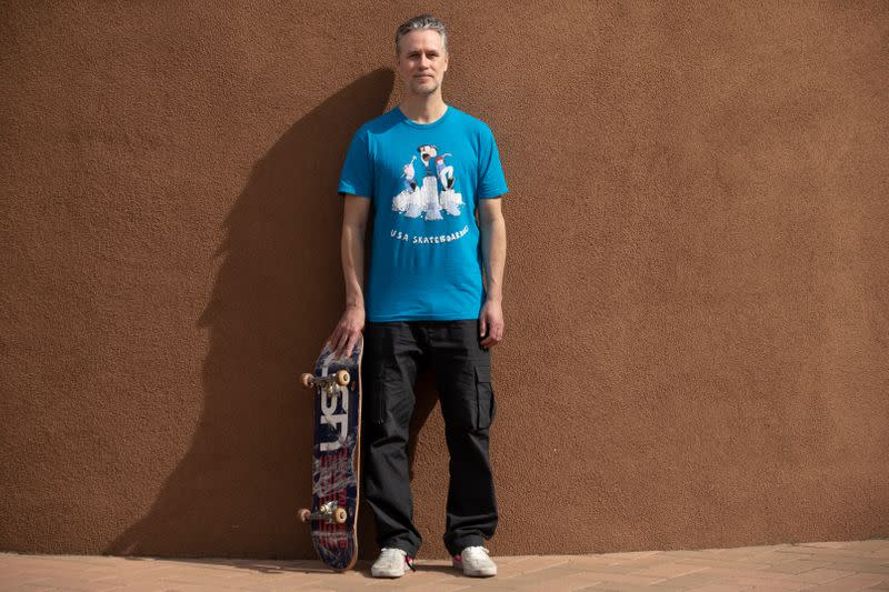 CEO at USA Skateboaring Friedberg with his skateboard in California