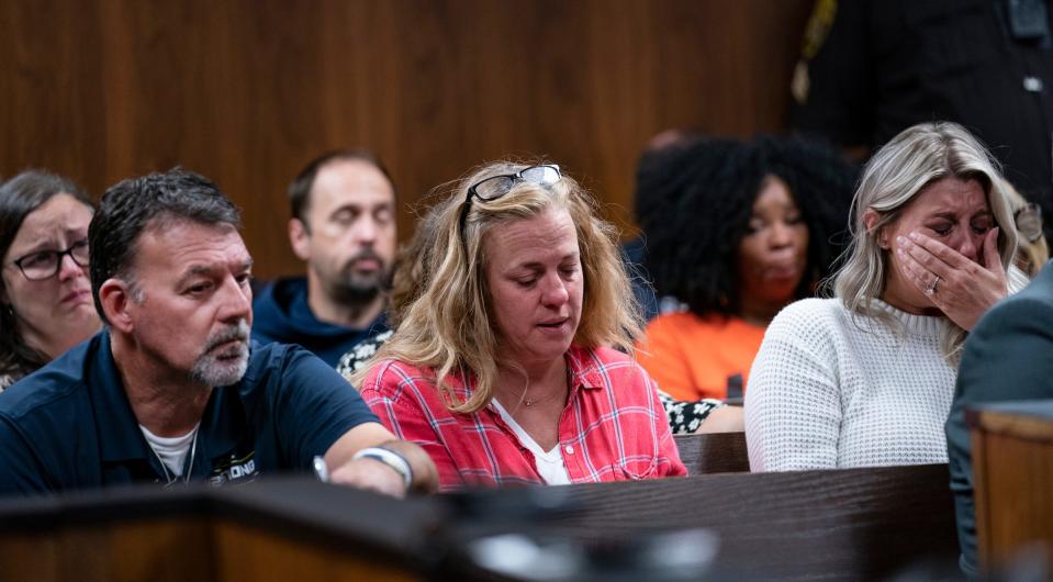 Families become emotional upon Oakland County Prosecutor Karen McDonald's closing statements as Ethan Crumbley appears in court, on Friday, Aug. 18, 2023, in Pontiac, Mich. The Oakland County Prosecutors are making their case that Crumbley, a teenager, should be sentenced to life without parole for killing four students at Oxford High School in 2021.