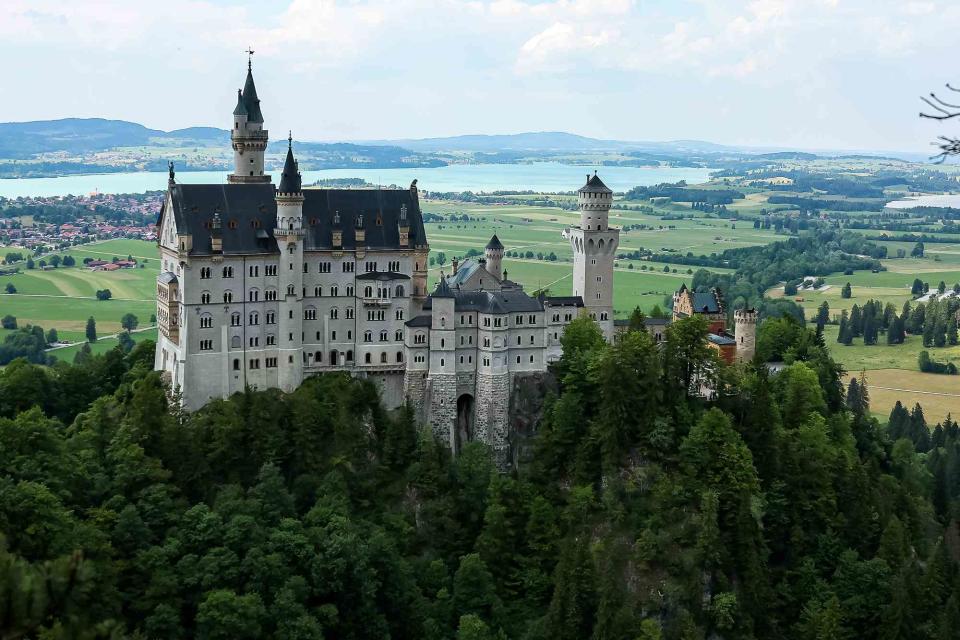 <p>Leonhard Simon/Getty</p> Neuschwanstein Castle in Fuessen, Germany, as photographed in June 2023