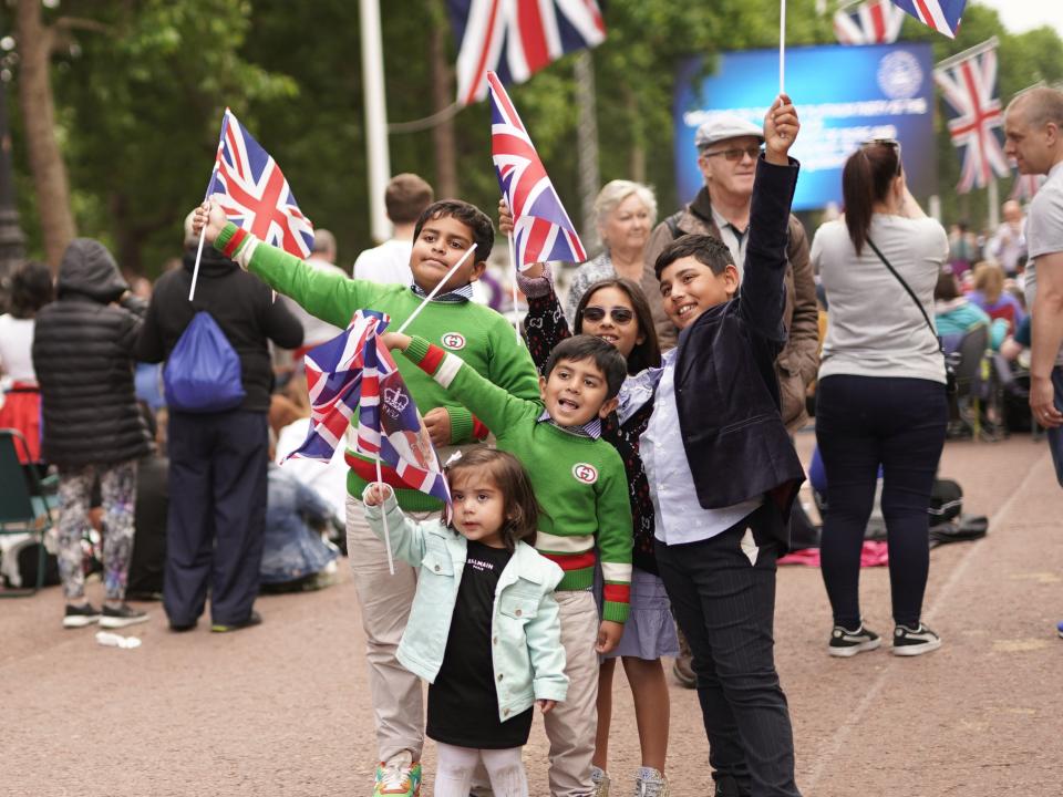 Members of the public on the Mall before the Platinum Party at the Palace in the front of Buckingham Palace (PA)