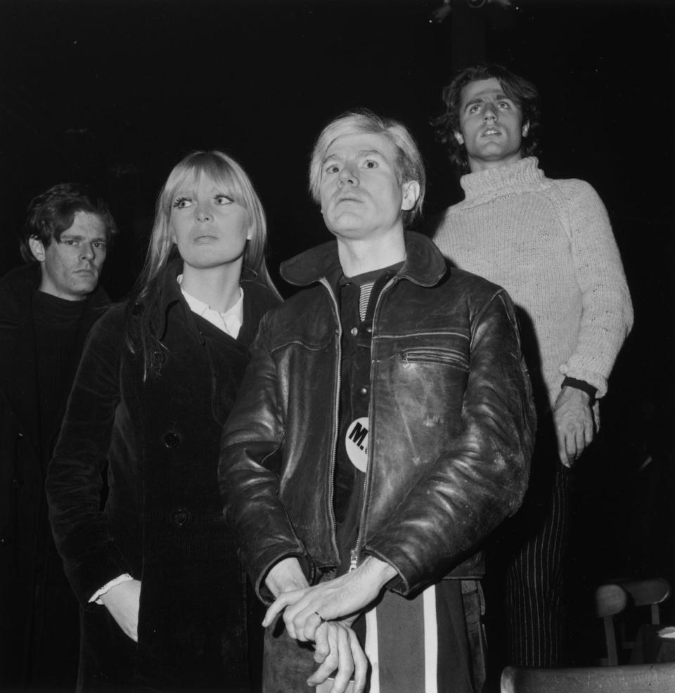 Left to right: Director Paul Morrissey, Nico, Andy Warhol, and poet Gerard Malanga attend a ‘Freakout’ party featuring a Velvet Underground and Nico performance in Long Island, New York, 1966. (Credit: Tim Boxer/Hulton Archive/Getty Images)