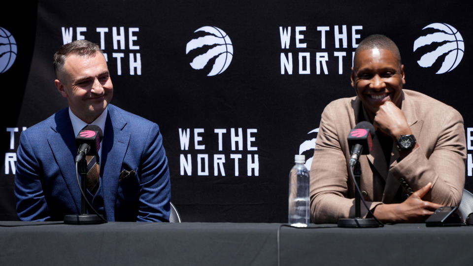 Masai Ujiri introduced new Raptors head coach Darko Rajakovic on Tuesday. (CP Photos)