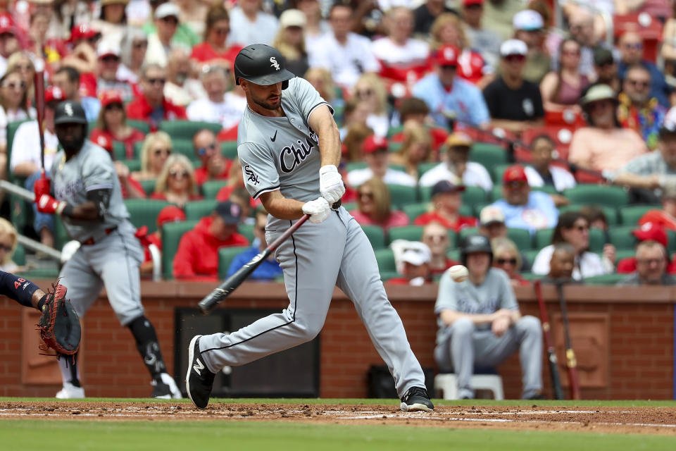 Chicago White Sox's Paul DeJong hits a ground rule double during the second inning of a baseball game against the St. Louis Cardinals, Sunday, May 5, 2024, in St. Louis. (AP Photo/Scott Kane)