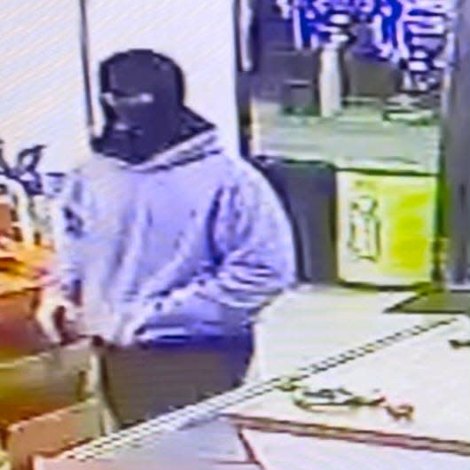 A video camera caught this image of the person wanted in connection with the shooting death of a store clerk Friday night in Fort Smith at Doug's Eastside Convenience Store.