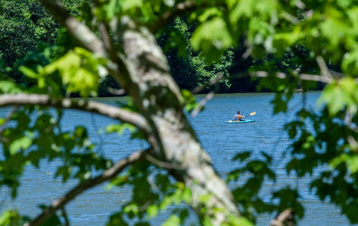 A kayaker spends time at Griffy Lake in 2020. A water main break near the lake means 3,300 customers are under a boil water advisory.