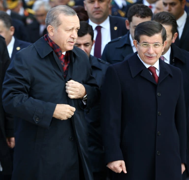 Turkish President Recep Tayyip Erdogan (left) and Prime Minister Ahmet Davutoglu visit the mausoleum of the founder of the Turkish Republic, Mustafa Kemal Ataturk, in Ankara on October 29, 2015