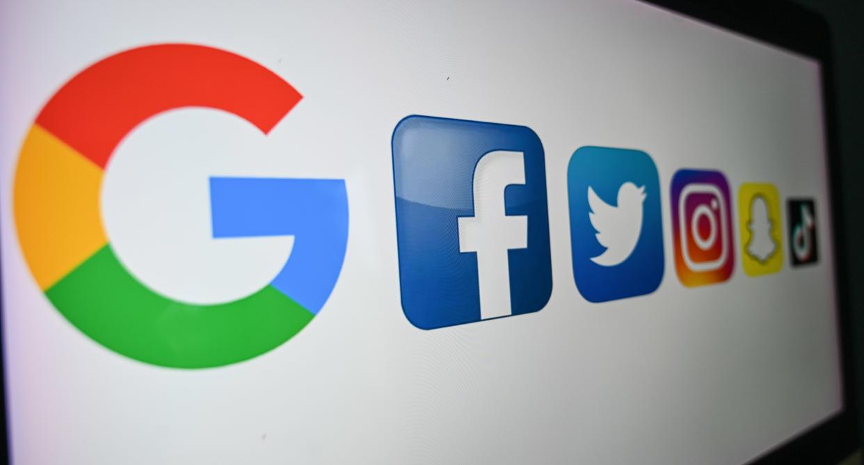 A photo taken on October 21, 2020 shows the logo of the multinational American Internet technology and services company, from left : Google, the American online social media and social networking service, Facebook, Twitter, Instragram, Snapchat, and Tik Tok on a computer screen in Lille. (Photo by DENIS CHARLET / AFP) (Photo by DENIS CHARLET/AFP via Getty Images)