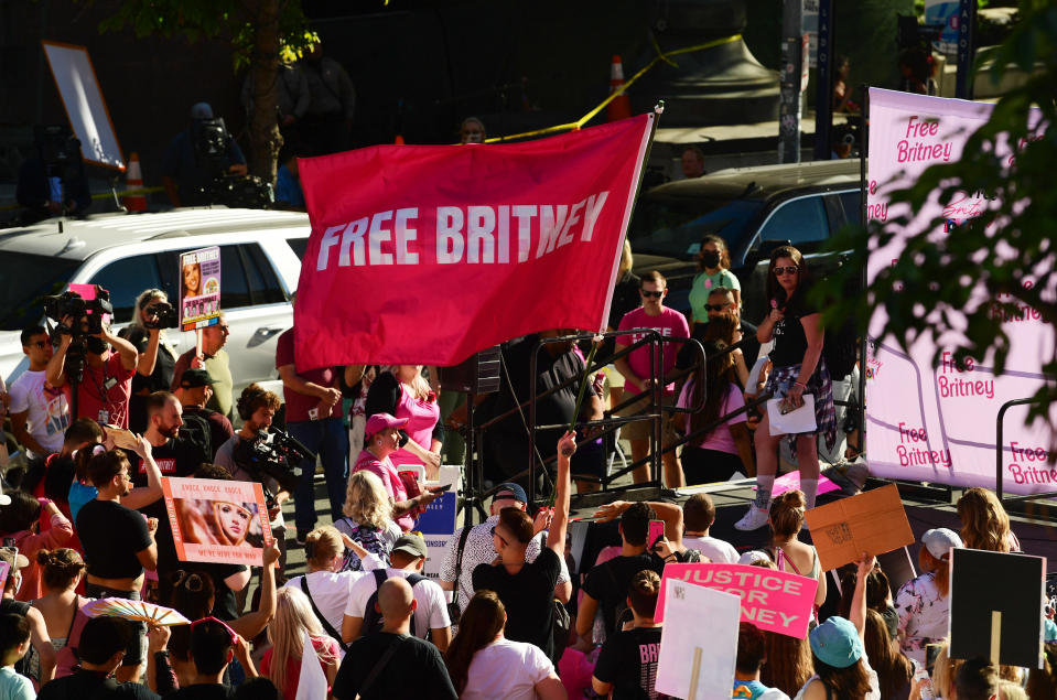 #FreeBritney protesters with signs that say "Free Britney" and "Justice for Britney" outside the courthouse