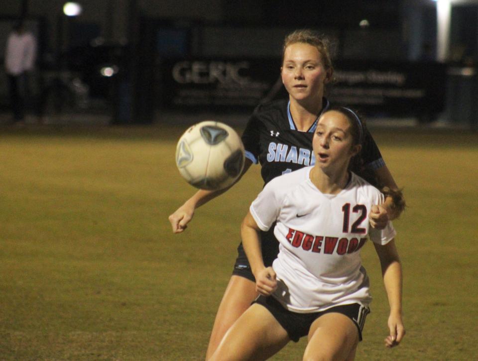 Ponte Vedra fullback Julia Gregory (16) and Edgewood midfielder Gianna Lopez (12) challenge for a bounding ball in a high school girls soccer game on December 15, 2023. [Clayton Freeman/Florida Times-Union]