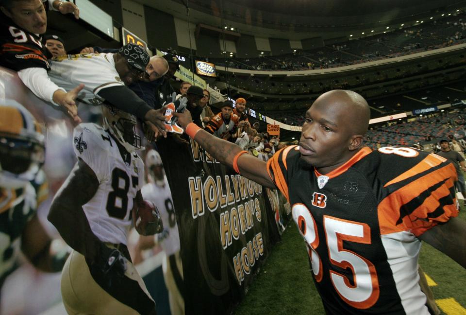 Cincinnati Bengals wide receiver Chad Johnson (85) gives his gloves away as the leaves the field after catching the touchdown passes against the New Orleans Saints in New Orleans, Sunday, Nov. 19, 2006.  The Bengals defeated the Saints 31-16.