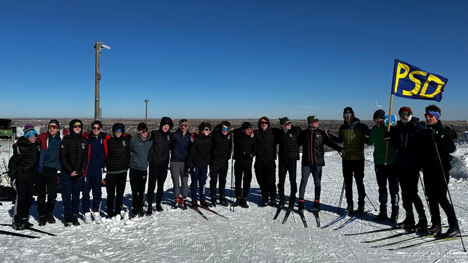 The Poudre School District boys Nordic ski team poses for a team photo during a home meet at Windsor's Hoedown Hill in Jan. 2024.