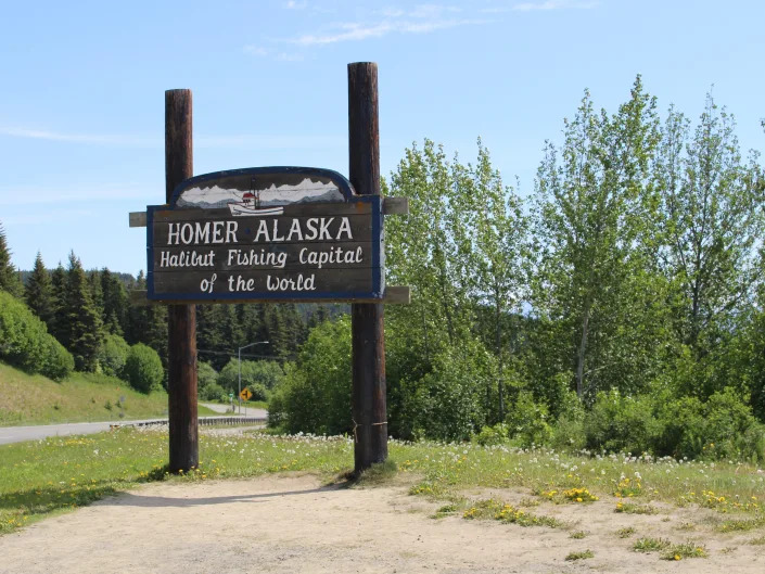 A sign in Alaska with a fish on it