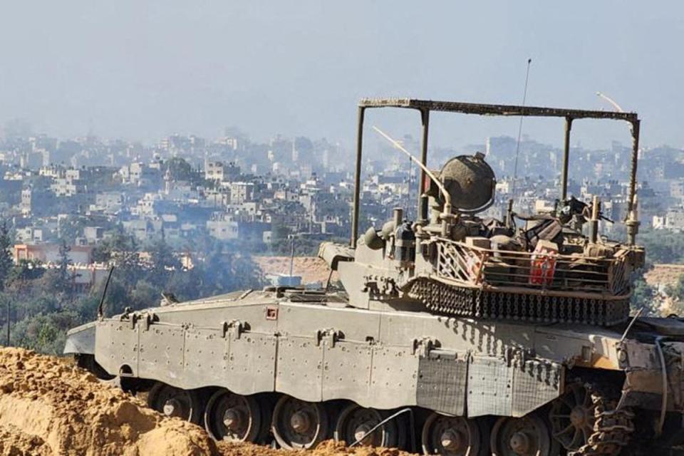 Israeli soldiers on an armed vehicle during a military operation around  Al-Shifa hospital in Gaza City (Israeli Defence Forces/AFP via G)