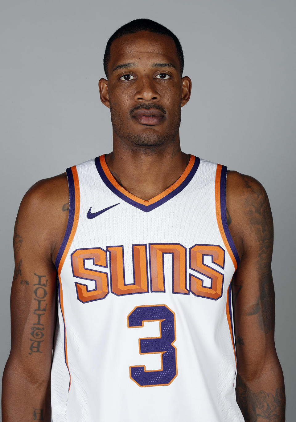 File-This photo taken Sept. 24, 2018, shows Phoenix Suns' Trevor Ariza posing for a photograph during media day at the NBA basketball team's practice facility in Phoenix. A person familiar with the deal says the Washington Wizards have an agreement in principle to acquire Ariza from the Phoenix Suns for Kelly Oubre Jr. and Austin Rivers. The person spoke to The Associated Press on condition of anonymity Saturday, Dec. 15, 2018, because it had not been announced by either team. (AP Photo/Matt York, File)