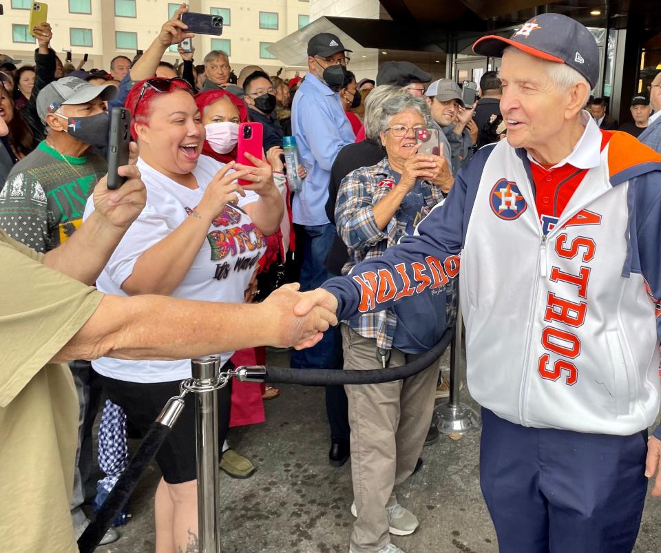 Jim McIngvale, known as Mattress Mack, is greeted by fans outside the newly opened Horseshoe Casino in Westlake, La., on Dec. 12, 2022. McIngvale placed a $1 million cash bet on the Houston Cougars to win the men's Final Four.