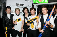 Celebrity photos: One Direction showed what big kids they are this week at the Men in Black 3 premiere over in America. The boys posed for the cameras with an assortment of toys – too cute.