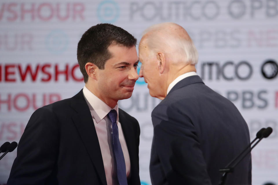 LOS ANGELES, CALIFORNIA - DECEMBER 19: Democratic presidential candidate South Bend, Indiana Mayor Pete Buttigieg (L) speaks with former Vice President Joe Biden during the Democratic presidential primary debate at Loyola Marymount University on December 19, 2019 in Los Angeles, California. Seven candidates out of the crowded field qualified for the 6th and last Democratic presidential primary debate of 2019 hosted by PBS NewsHour and Politico. (Photo by Justin Sullivan/Getty Images)