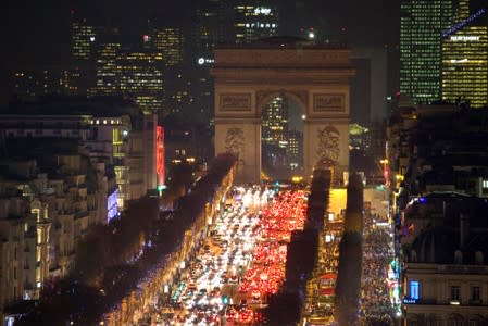 FILE PHOTO: General view of the Champs Elysees Avenue as rush hour traffic fills the avenue leading up to the Arc de Triomphe in Paris