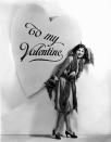 <p>Actress Dorothy Gulliver delivers one super-sized Valentine's Day card. </p>