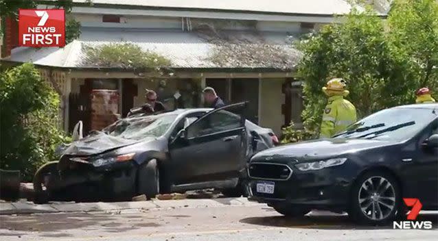 The blue car later crashed into the front wall of a house. Source: 7 News