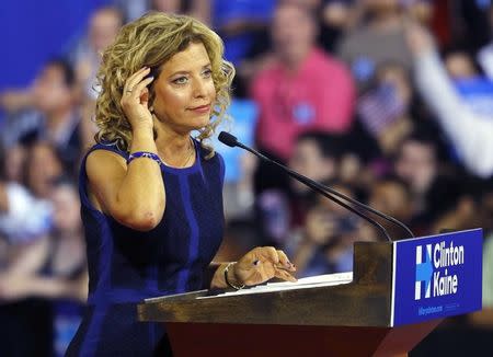 Democratic National Committee (DNC) Chairwoman Debbie Wasserman Schultz speaks at a rally, before the arrival of Democratic U.S. presidential candidate Hillary Clinton and her vice presidential running mate U.S. Senator Tim Kaine, in Miami, Florida, U.S. July 23, 2016. REUTERS/Scott Audette