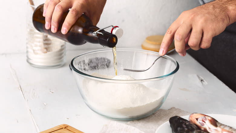 Person making a beer batter