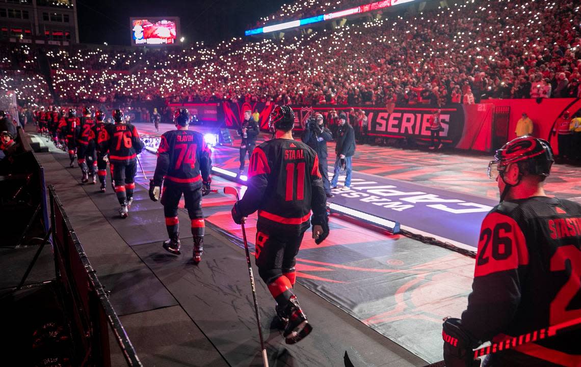 Carolina Hurricanes’ Jordan Staal (10) enters the field with his teammates for the Stadium Series game against the Washington Capitals on Saturday, February 18, 2022 at Carter-Finley Stadium in Raleigh, N.C.