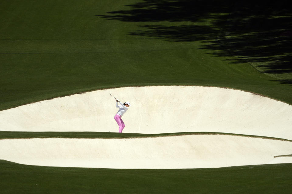 Rose Zhang hits from a bunker on the eighth fairway during the final round of the Augusta National Women's Amateur golf tournament at Augusta National Golf Club, Saturday, April 3, 2021, in Augusta, Ga. (AP Photo/David J. Phillip)