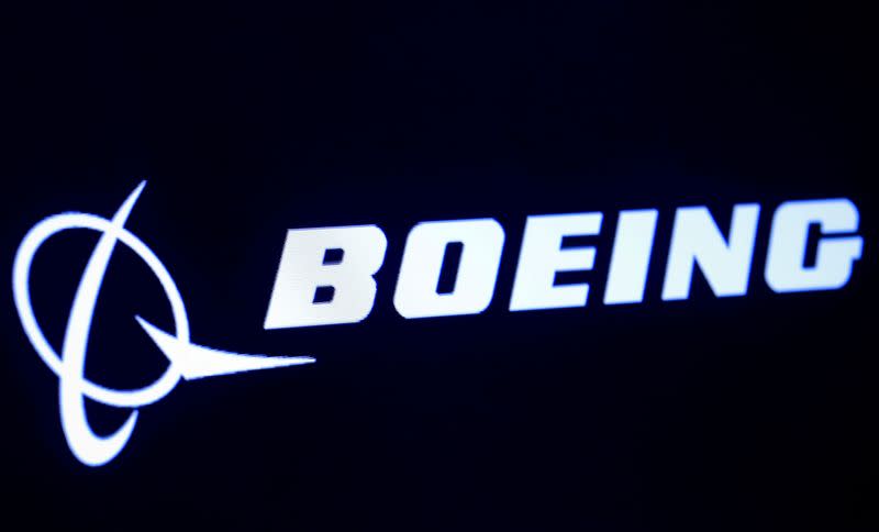 FILE PHOTO: FILE PHOTO: The company logo for Boeing is displayed on a screen on the floor of the NYSE in New York