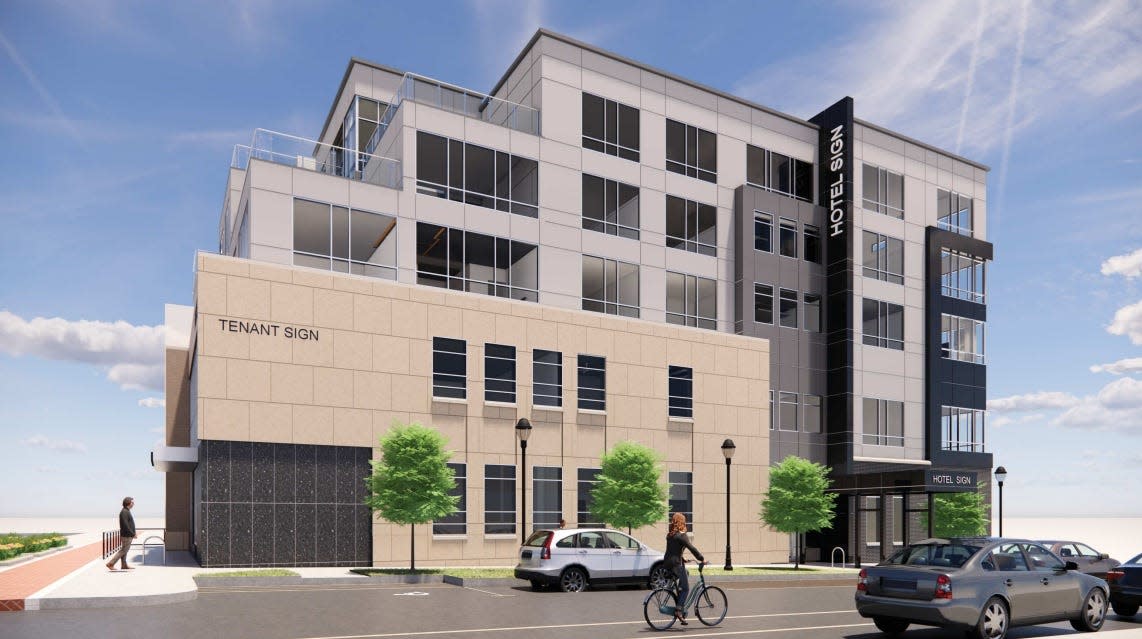 Developers now plan to turn The Peoples State Bank building into a boutique hotel. A rendering shows a stepped-back fifth floor.