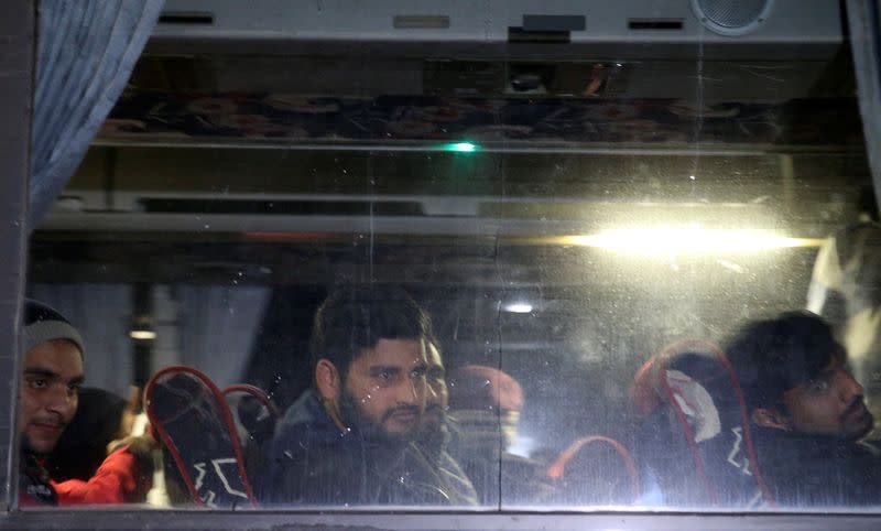 Migrants arrive at the reception center in Usivak, near Sarajevo