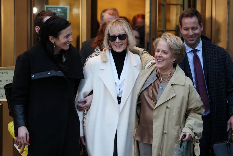 E. Jean Carroll walks outside the Manhattan Federal Court, in New York City