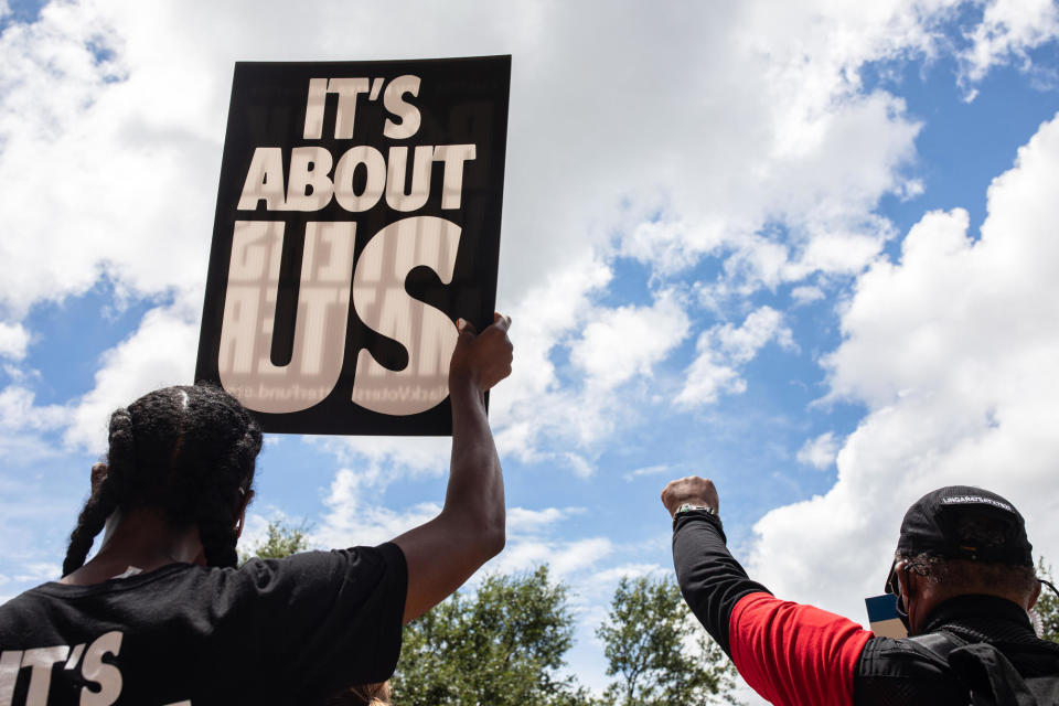 FILE -- Demonstrators are gathered outside of the Texas State Capitol during a voting rights rally on the first day of the 87th Legislature's special session on July 8, 2021, in Austin, Texas.  / Credit: Tamir Kalifa / Getty Images