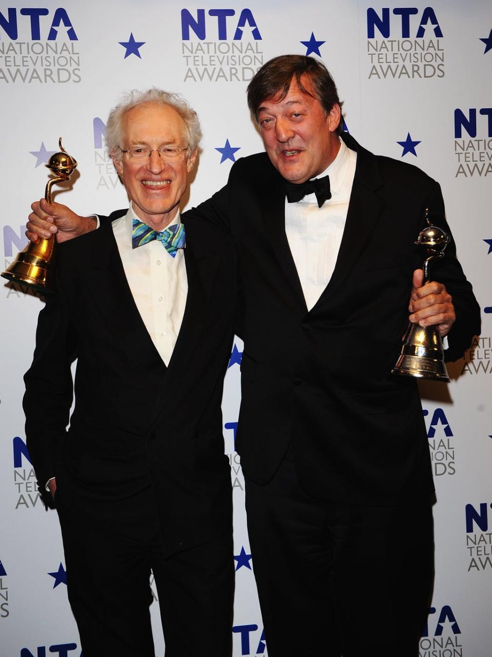 With Stephen Fry at the 2010 National Television Awards (Getty)