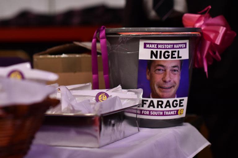 A donations bucket carrying an image of UK Independence Party (UKIP) leader Nigel Farage is seen on the first day of the UKIP spring conference in Margate, Kent, on February 27, 2015