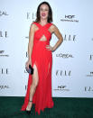 <p>Juliette Lewis showed some leg in this sexy, red Thai Nguyen Atelier gown. <i>(Photo by Steve Granitz/WireImage)</i> </p>