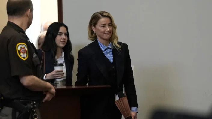 Amber Heard enters the courtroom at the Fairfax County Circuit Court in Fairfax, Virginia, on May 3, 2022. <span class="copyright">Jim Watson/Pool/AFP</span>