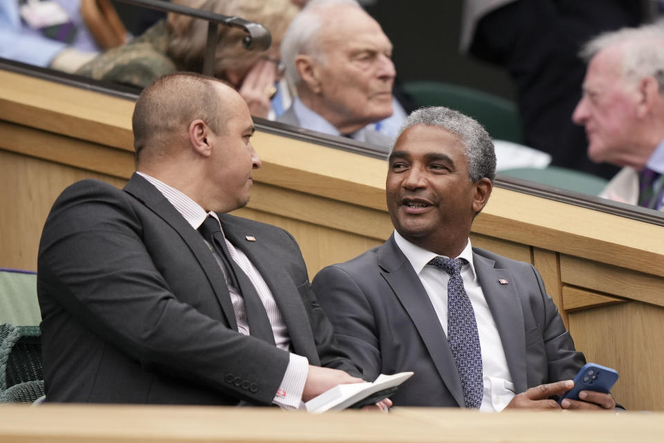 Tunisia's Sports Minister Kamel Deguiche sits in the Royal Box ahead of the final of the women's singles between the Czech Republic's Marketa Vondrousova and Tunisia's Ons Jabeur on day thirteen of the Wimbledon tennis championships in London, Saturday, July 15, 2023. (AP Photo/Alberto Pezzali)