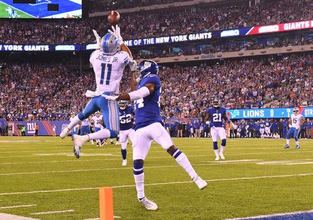 Sep 18, 2017; East Rutherford, NJ, USA; Detroit Lions wide receiver Marvin Jones Jr., (11) catches a touchdown pass over New York Giants cornerback Eli Apple (24) in the first quarter during a NFL football game at MetLife Stadium. Mandatory Credit: Robert Deutsch-USA TODAY Sports