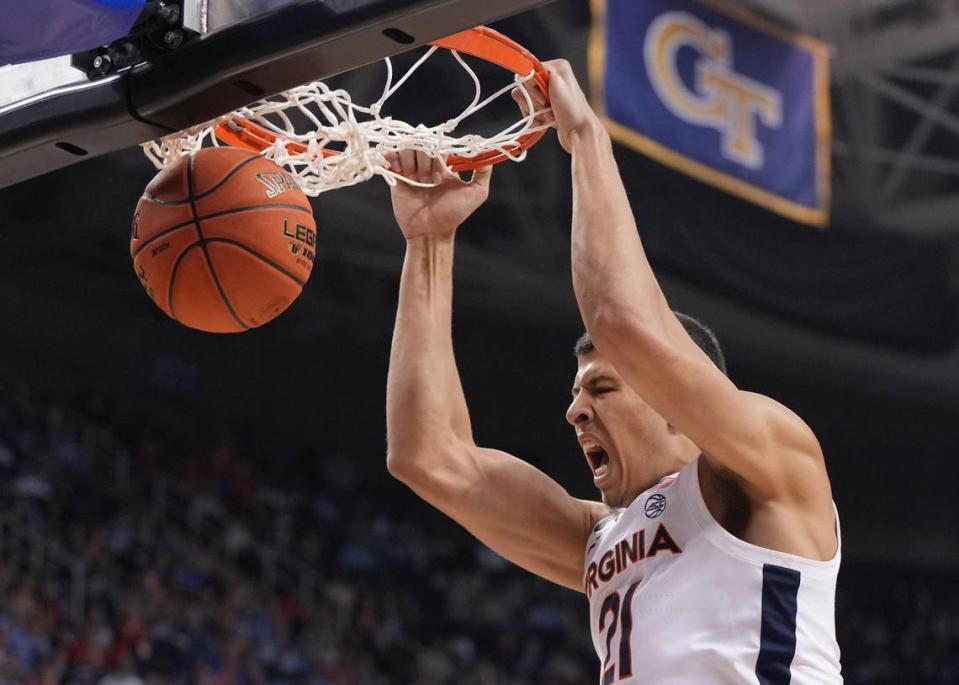 Virginia Cavaliers forward Kadin Shedrick (21) scores in the second half of the quarterfinals of the ACC Tournament at Greensboro Coliseum on March 9, 2023.