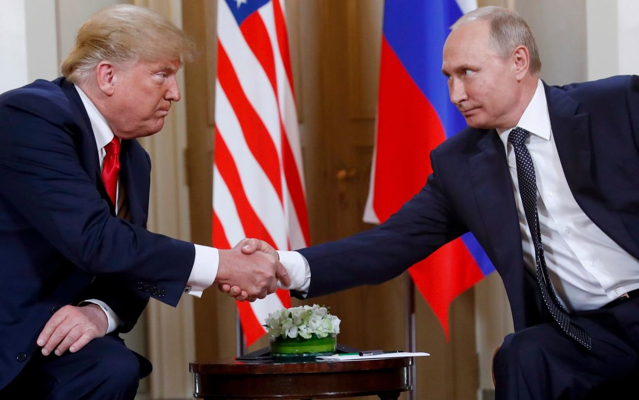 Donald Trump and Vladimir Putin meet in 2018