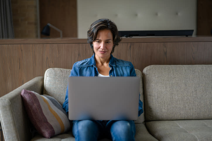 A woman reviewing her financial plan.