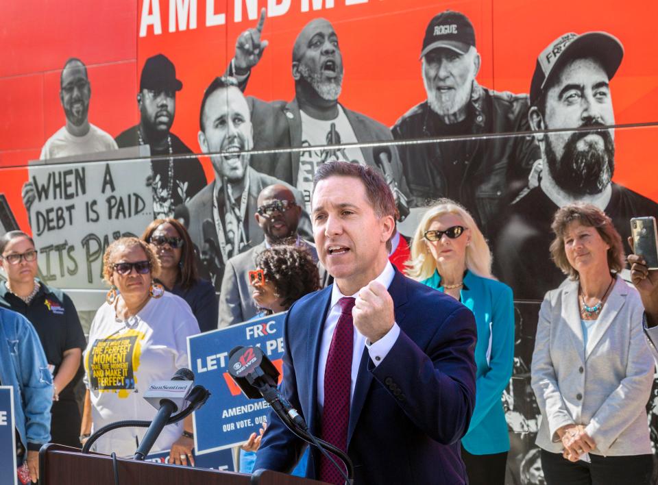 Palm Beach County State Attorney Dave Aronberg speaks during the Florida Rights Restoration Coalition statewide bus tour's stop in West Palm Beach Thursday, November 7, 2019. Waiting to speak behind him at right are Clerk & Comptroller Sharon R. Bock and Public Defender Carey Haughwout.