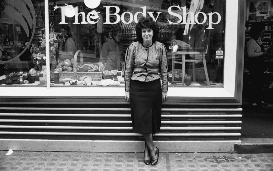 Businesswoman, human rights activist and environmental campaigner Anita Roddick (1942-2007) outside a Body Shop store in 1984