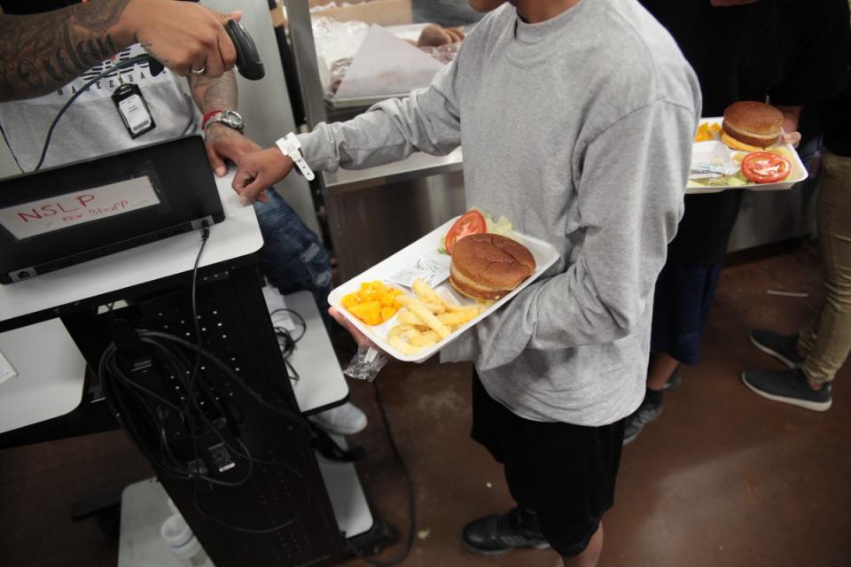 Mealtime at Casa Padre, the nation’s largest child care facility for undocumented children, in Brownsville, Texas. (Photo: Department of Health and Human Services)