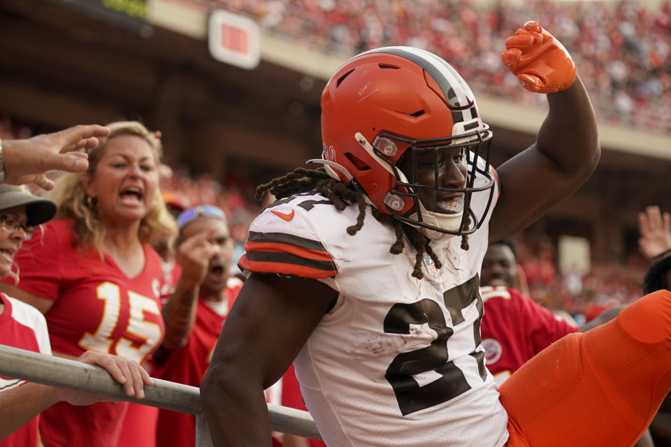 Cleveland Browns running back Kareem Hunt celebrates after scoring during the second half of an NFL football game against the Kansas City Chiefs Sunday, Sept. 12, 2021, in Kansas City, Mo. (AP Photo/Charlie Riedel)